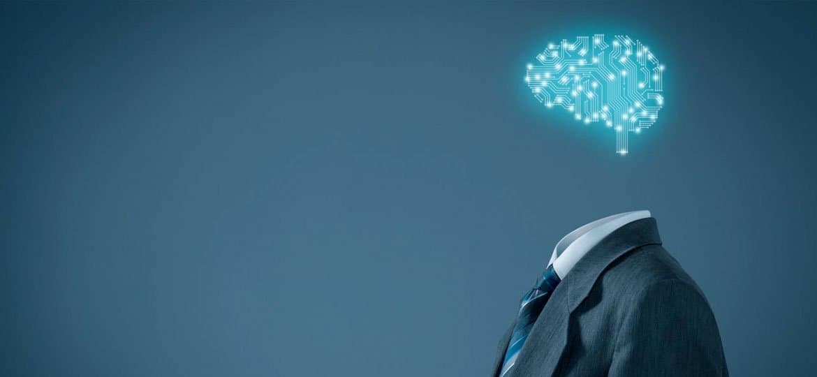 Desenho de um cérebro em forma de circuito flutuando sobre um terno simbolizando inteligência artificial